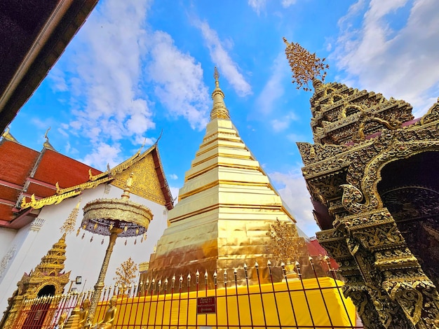 a temple with a golden temple in the background and a temple in the background