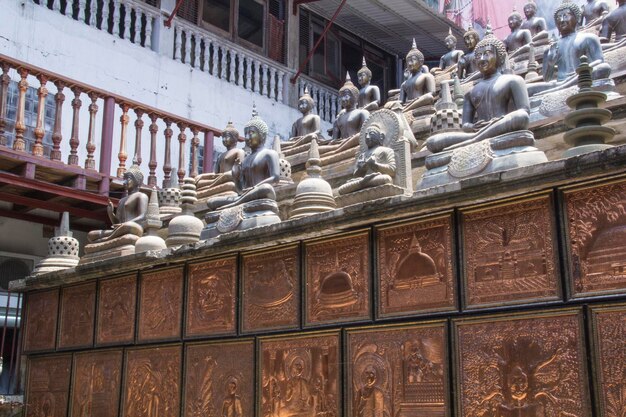 A temple with statues on the top of it