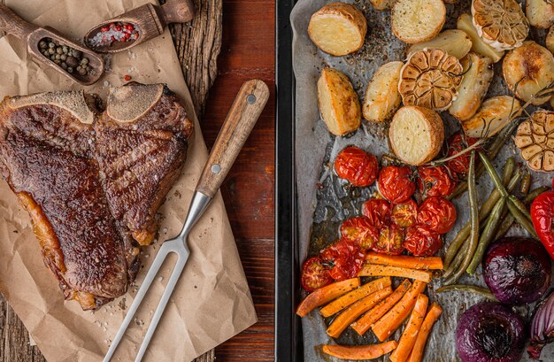 tender and juicy steak on the bone grilled next to baked and grilled vegetables, the concept of tasty and healthy nutrition