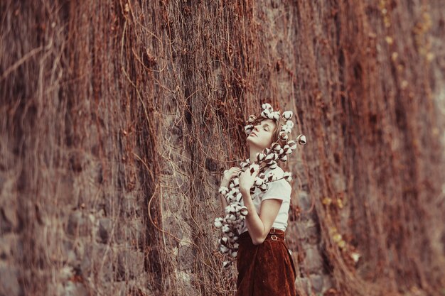 Tender woman enjoing nature. Boho style fashion.