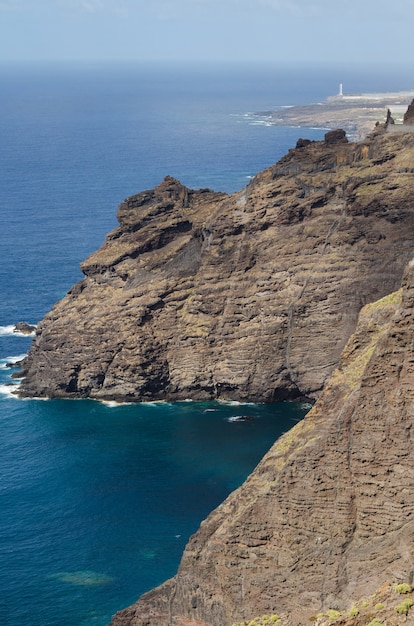 Tenerife volcanic landscape and lighthouse in the background, Tenerife, Canary islands, Sp