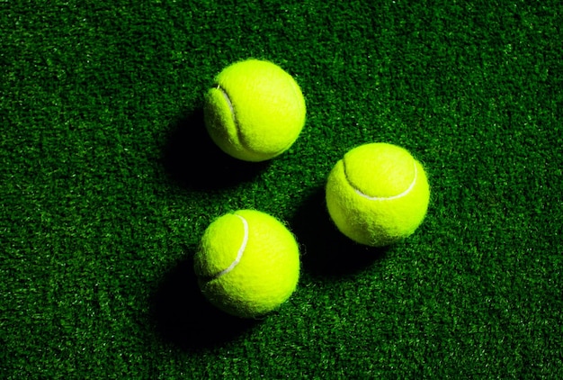 Tennis Ball isolated on black with dramatic lighting