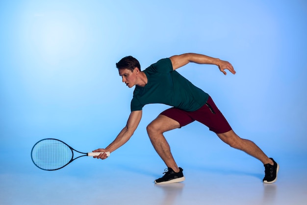 Tennis player holding racket full shot