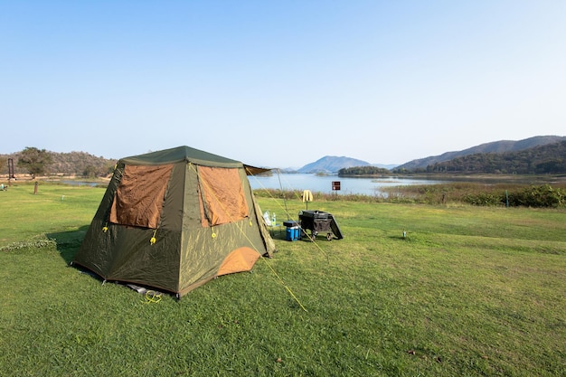 Tent on field against clear sky