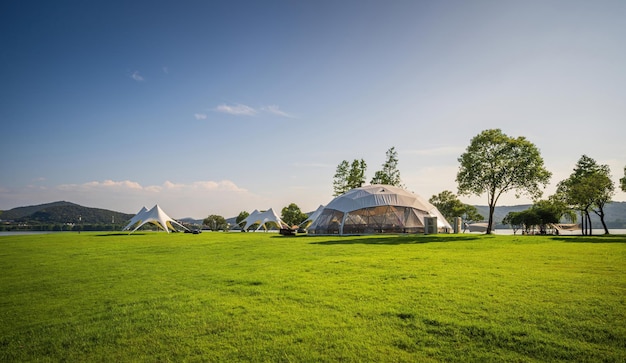 Tents for camping on the lawn on a sunny day travel theme