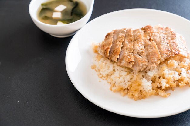 teriyaki pork on topped rice with miso soup