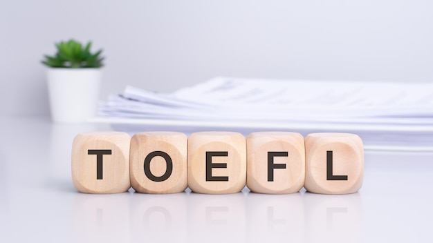 the term toefl is inscribed on wooden blocks creating a frontview composition