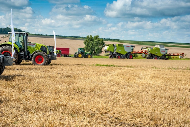 TERNOPIL REGION, UKRAINE - August 10, 2021: at the demonstration of agricultural machinery - combines and tractors, exhibition of company Lan