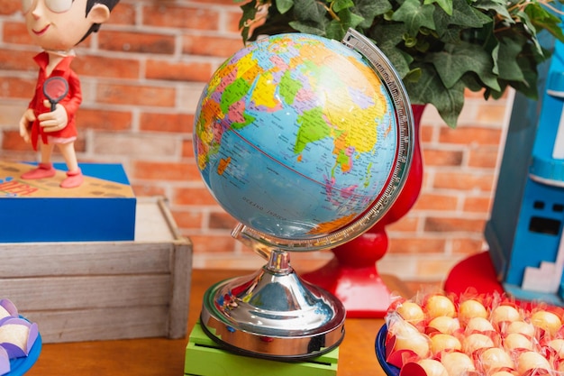 Terrestrial globe in decorated scenery world globe geography basic education