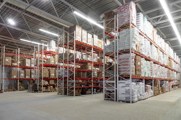 The territory of a large logistics center with racks for storing goods before being sent to the sender