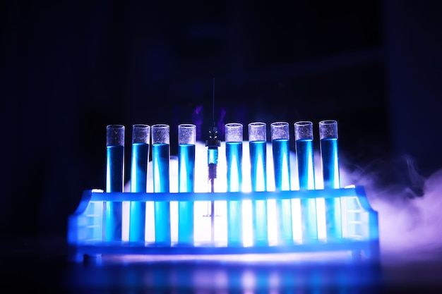 Test tube of glass overflows new liquid solution potassium blue conducts an analysis reaction takes various versions reagents using chemical pharmaceutics cancer manufacturing .