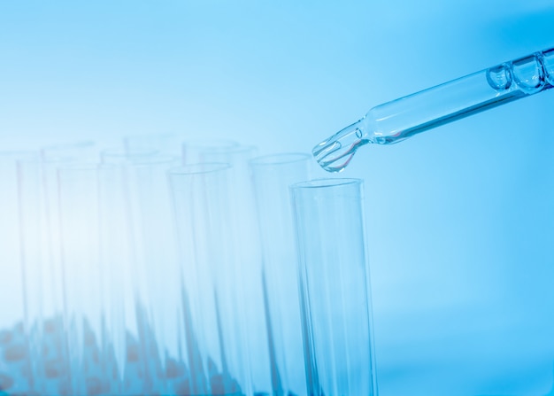 Test tube in the laboratory on a blue background