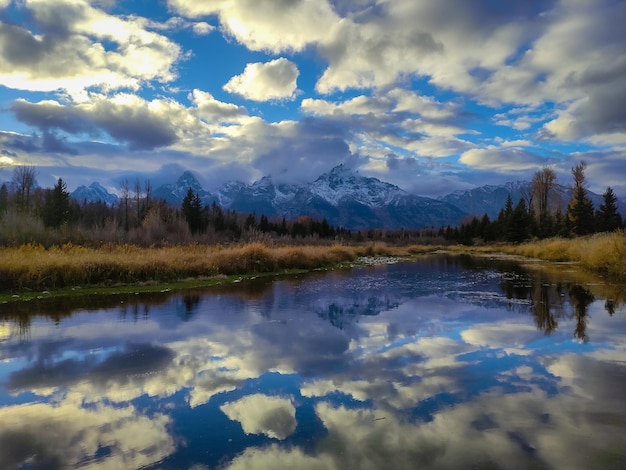 Teton Mountain Range and Reflection in Snake River. Schwabacher Landing. Grand Teton National Park, Wyoming, USA