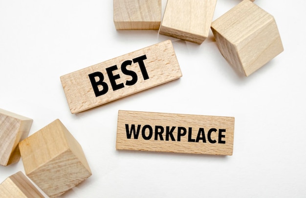 Text BEST WORKPLACE on wooden blocks concept business succeed