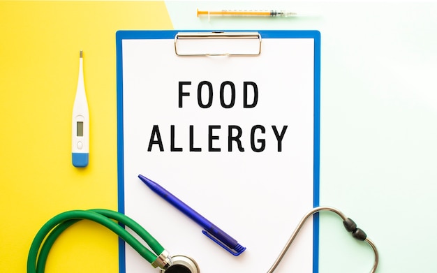 Text FOOD ALLERGY on a letterhead in a medical folder Stethoscope