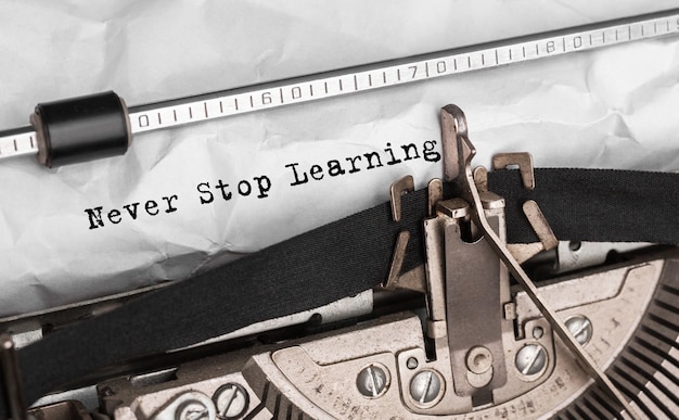 Text Never Stop Learning typed on retro typewriter