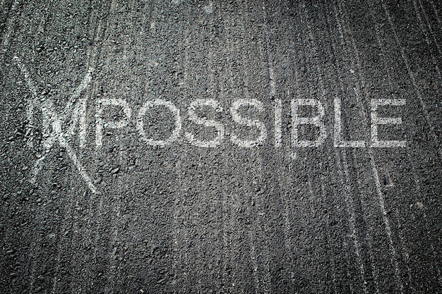 Text  written on an asphalt road