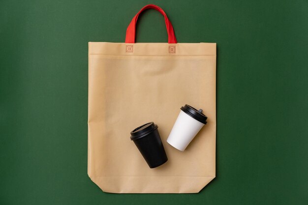 Photo textile shopping bag and coffee cup flat lay