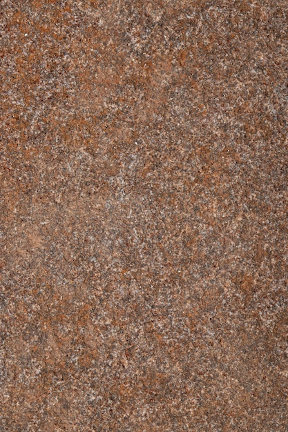 textural plaster of the house wall colored granite chips background