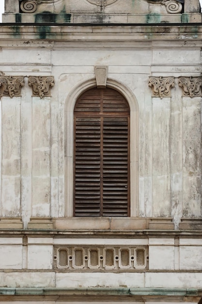 Texture of aged wooden window of ancient medieval building