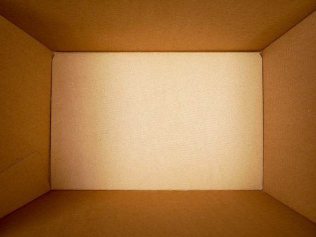 Photo texture background brown paper box , empty open rectangular cardboard box