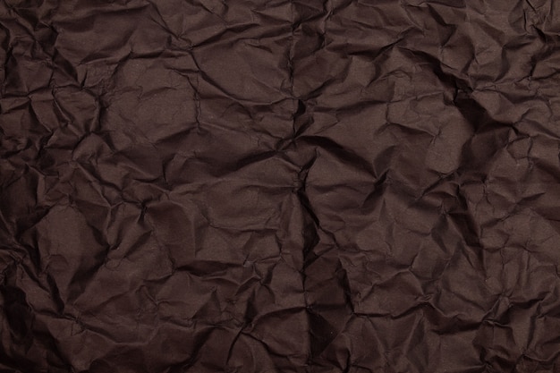 Texture or background of detailed black toned crumpled paper