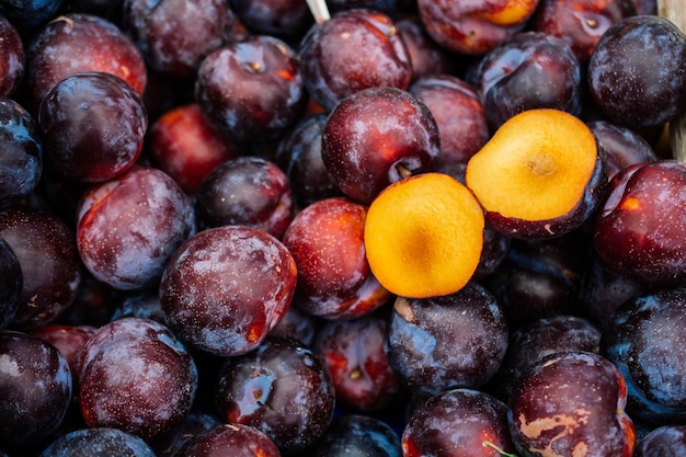 Texture background of fresh blue plums as fruit image