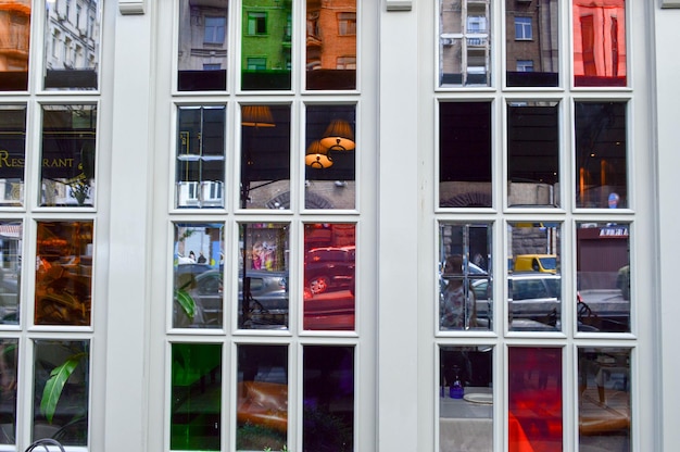 The texture of a beautiful window with multicolored glasses stainedglass windows in the street