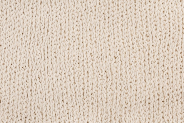 Photo texture of a beige carpet with a white textured background