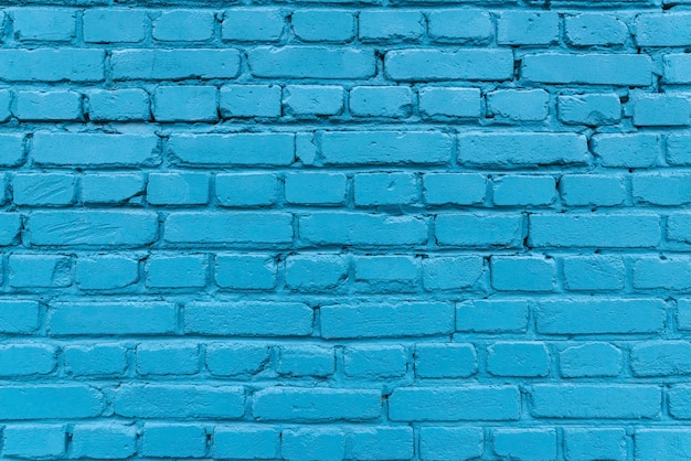 Texture of a blue brick wall of a house.