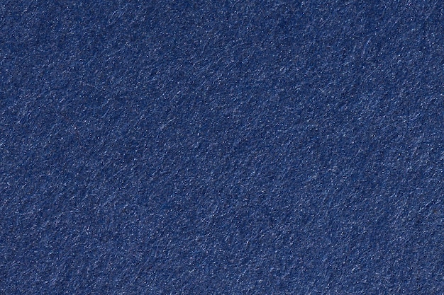 Texture of blue color a brushed paper sheet. High resolution photo.