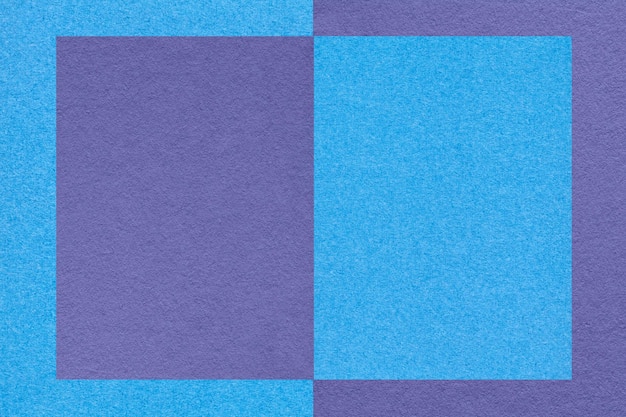 Texture of blue and violet paper background with geometric shape and pattern macro Craft turquoise cardboard