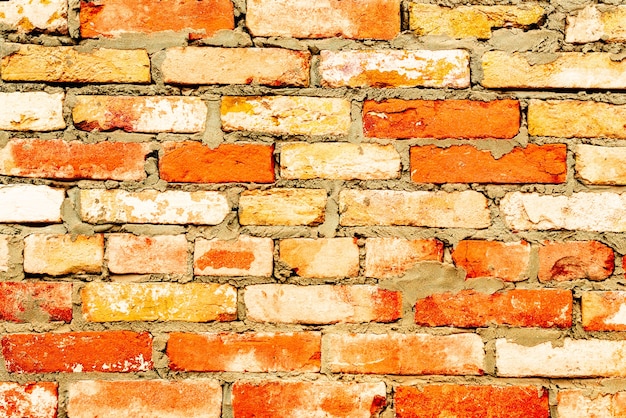 Texture, brick, wall background. Brick texture with scratches and cracks