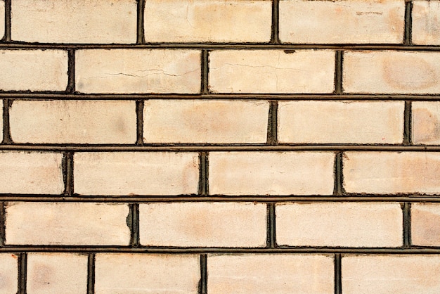 Texture, brick, wall background. Brick texture with scratches and cracks