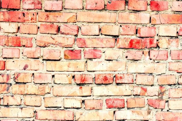 Texture, brick, wall, it can be used as a background. Brick texture with scratches and cracks