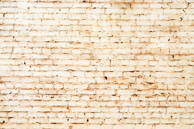 Texture, brick, wall, it can be used as a background. Brick texture with scratches and cracks