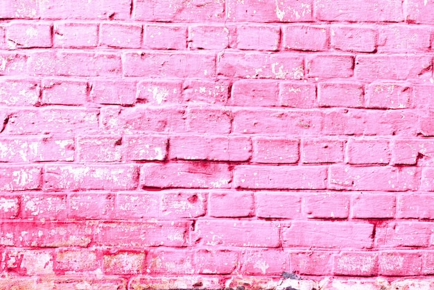 Texture of a brick wall with cracks and scratches which can be used as a background