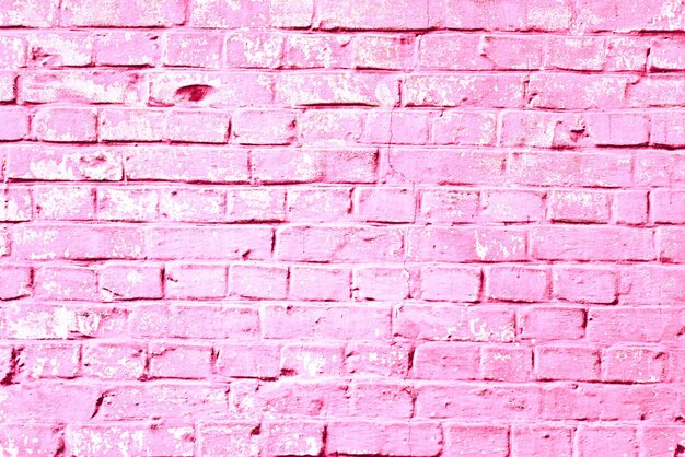 Texture of a brick wall with cracks and scratches which can be used as a background