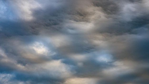 Texture of bright blue dramatic cloudy sky