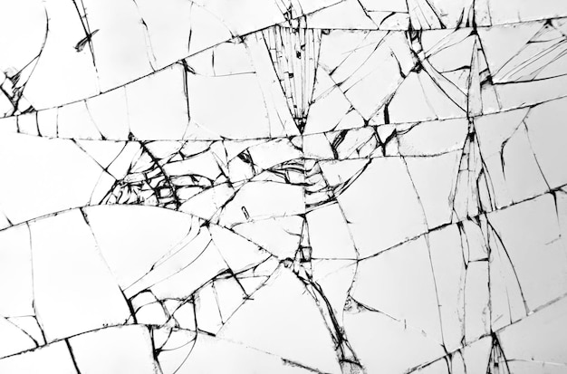 Texture of broken glass cracks on glass with white background concept of cracks for design