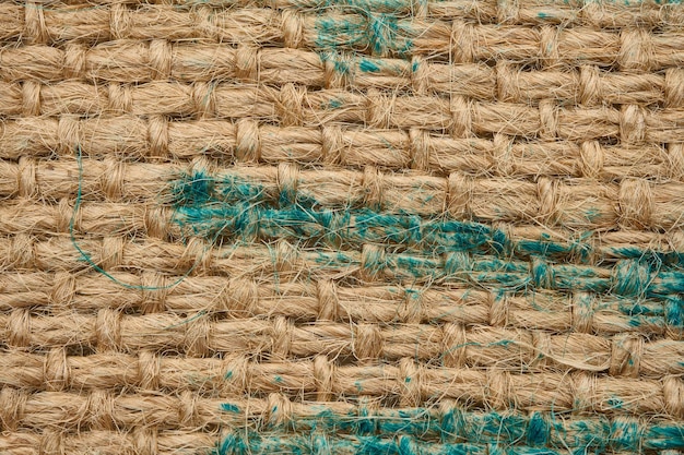 Texture of brown burlap rough fabric with fibers for bags macro