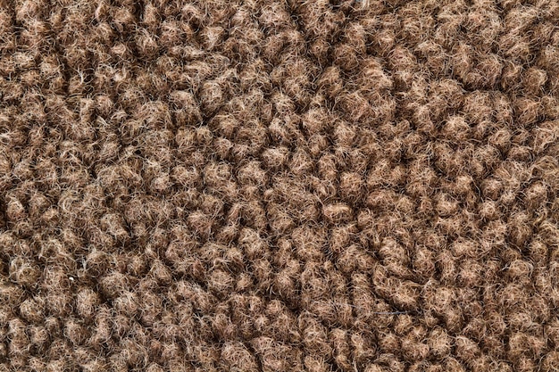 Texture of a brown wool cloth in a close up view