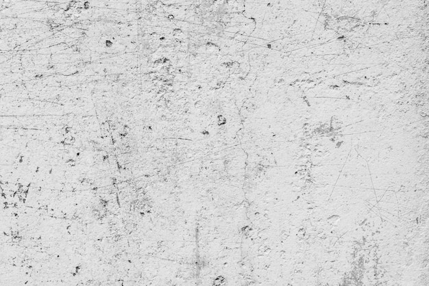 Texture of a concrete wall with cracks and scratches background