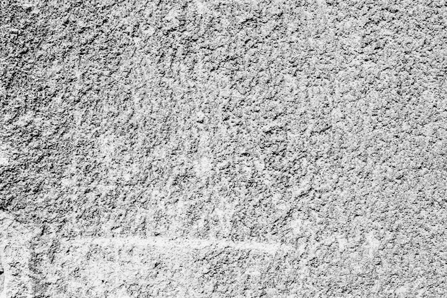 Texture of a concrete wall with cracks and scratches which can be used as a background