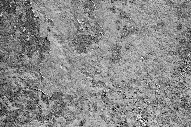 Texture of a concrete wall with cracks and scratches which can be used as a background