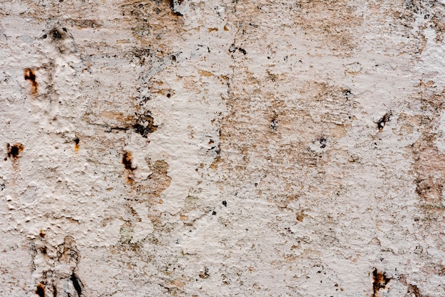 Texture of a concrete wall with cracks and scratches 