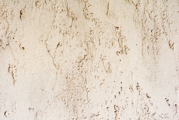 Texture of a concrete wall with cracks and scratches 