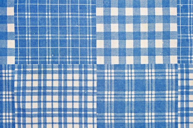 Texture of the cotton fabric with a blue checkered pattern