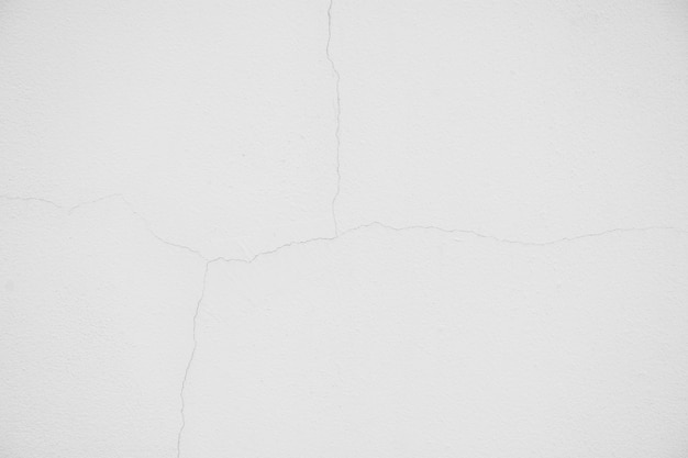 Texture of crack white cement wall - background