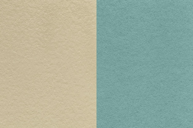 Texture of craft beige and blue paper background half two colors Vintage brown and cerulean cardboard